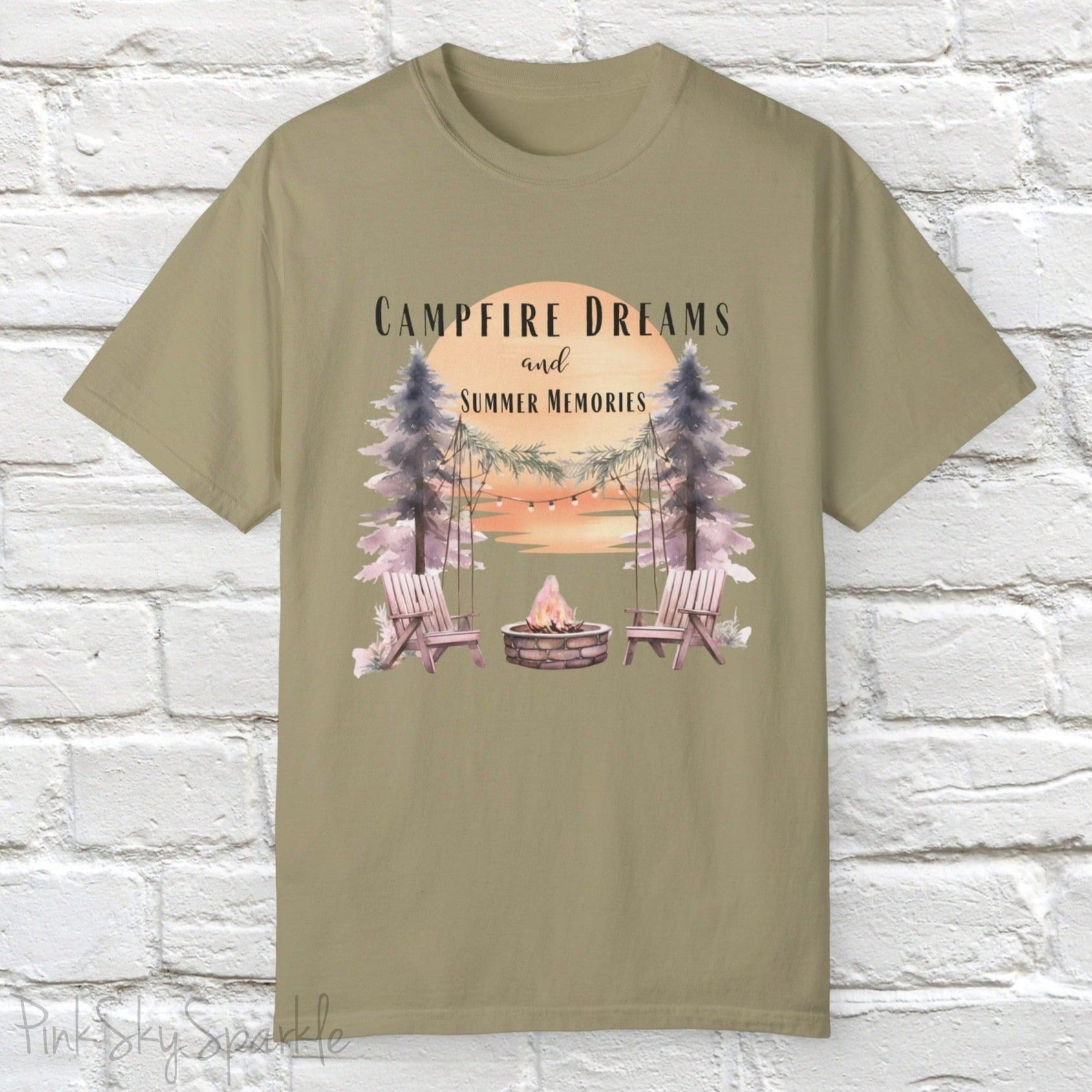 Campfire Dreams and Summer Memories Unisex Garment-Dyed T-shirt. Escape to the great outdoors with our Campfire Dreams and Summer Memories Garment-Dyed T-shirt. Made from soft, high-quality fabric, this shirt is perfect for cozy nights by the fire or creating unforgettable summer memories. Featuring the graphics of a scenery of a sunset, trees, patio lights, a fire pit and two wood chairs.
