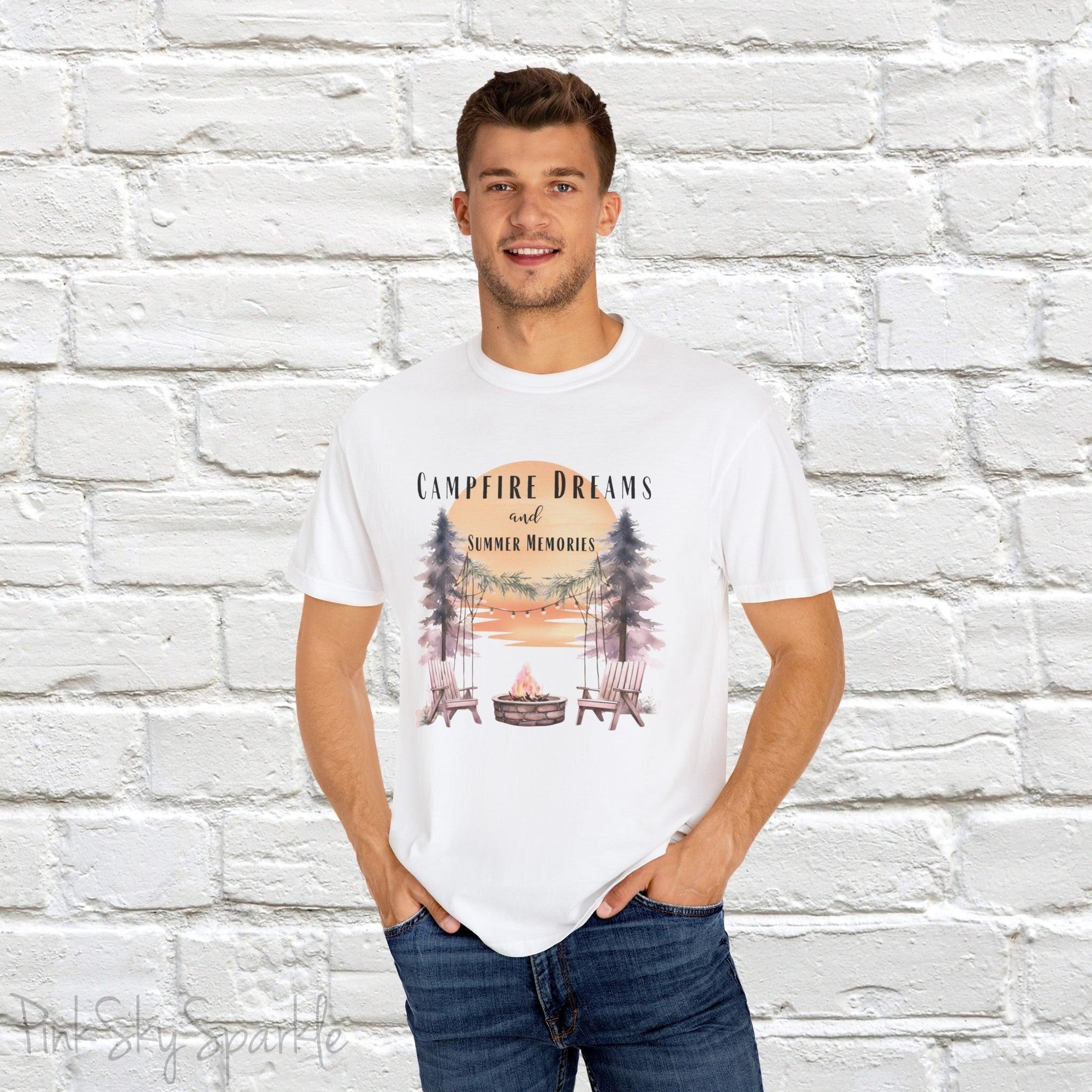 Campfire Dreams and Summer Memories Unisex Garment-Dyed T-shirt. Escape to the great outdoors with our Campfire Dreams and Summer Memories Garment-Dyed T-shirt. Made from soft, high-quality fabric, this shirt is perfect for cozy nights by the fire or creating unforgettable summer memories. Featuring the graphics of a scenery of a sunset, trees, patio lights, a fire pit and two wood chairs.