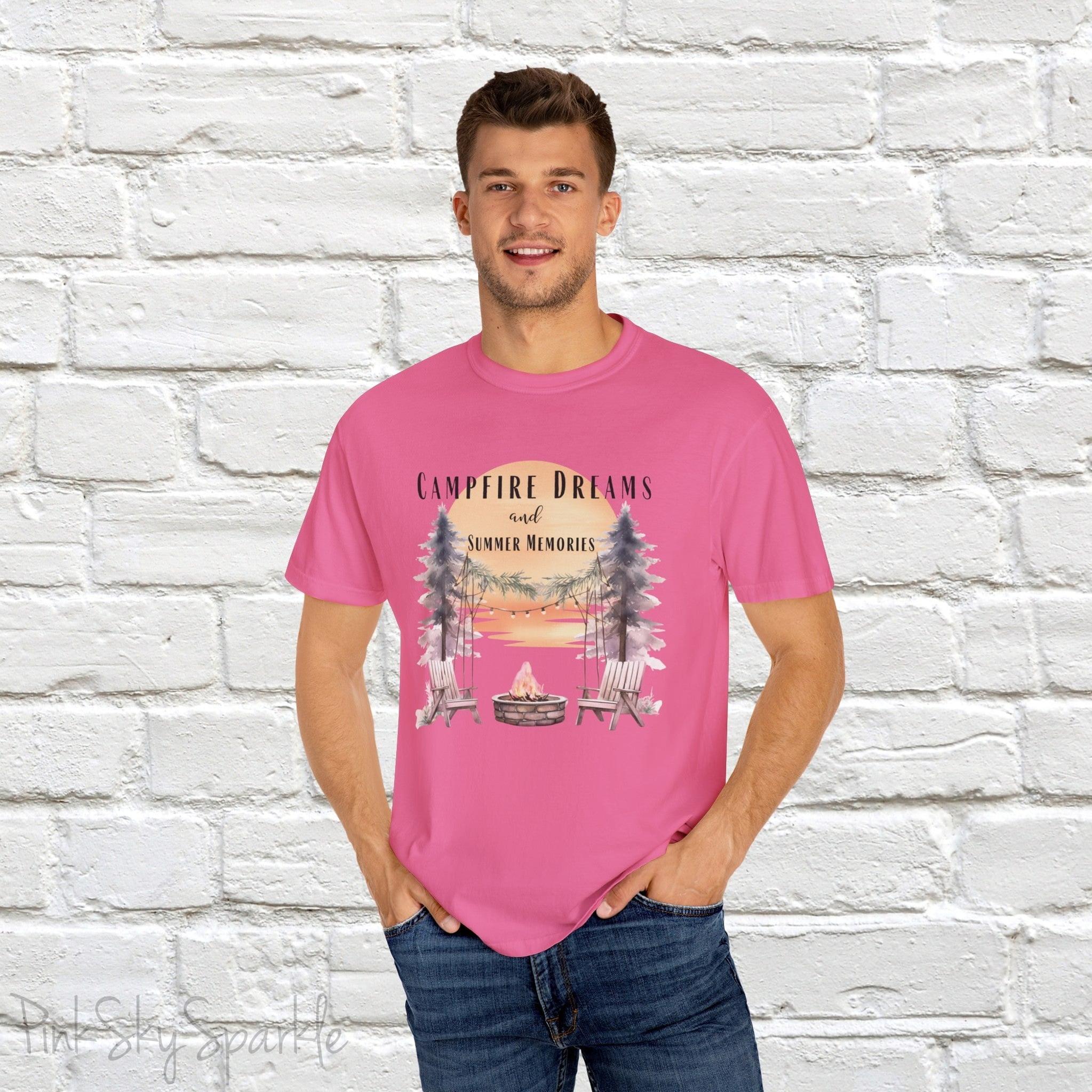 Campfire Dreams and Summer Memories Unisex Garment-Dyed T-shirt. Escape to the great outdoors with our Campfire Dreams and Summer Memories Garment-Dyed T-shirt. Made from soft, high-quality fabric, this shirt is perfect for cozy nights by the fire or creating unforgettable summer memories. Featuring the graphics of a scenery of a sunset, trees, patio lights, a fire pit and two wood chairs.