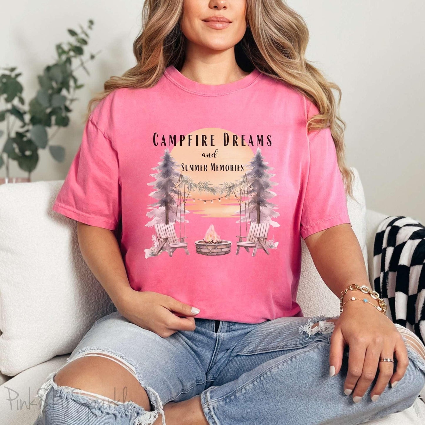 Campfire Dreams and Summer Memories Unisex Garment-Dyed T-shirt. Escape to the great outdoors with our Campfire Dreams and Summer Memories Garment-Dyed T-shirt. Made from soft, high-quality fabric, this shirt is perfect for cozy nights by the fire or creating unforgettable summer memories. Featuring the graphics of a scenery of a sunset, trees, patio lights, a fire pit and two wood chairs.