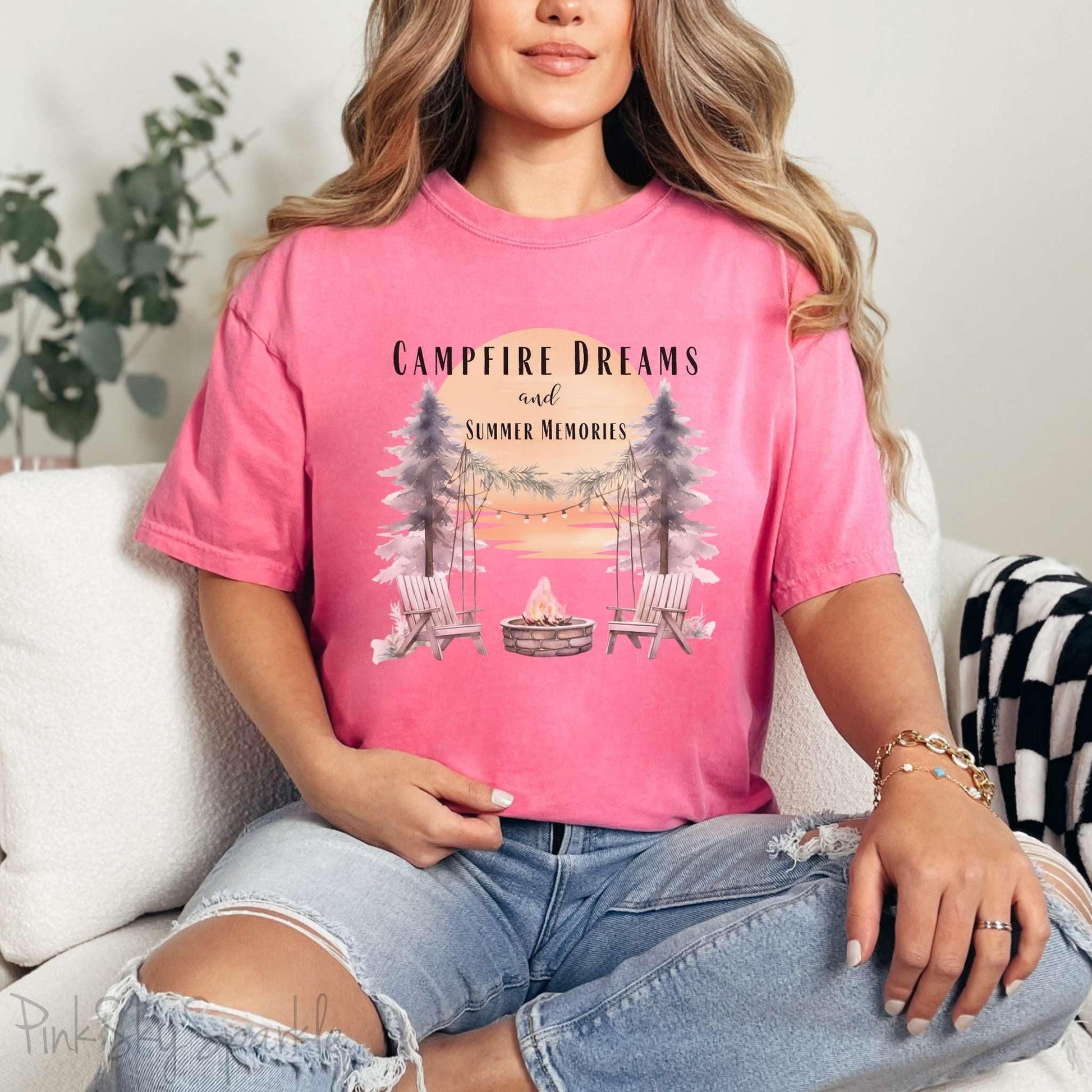 Campfire Dreams and Summer Memories Unisex Garment-Dyed T-shirt. Escape to the great outdoors with our Campfire Dreams and Summer Memories Garment-Dyed T-shirt. Made from soft, high-quality fabric, this shirt is perfect for cozy nights by the fire or creating unforgettable summer memories. Featuring the graphics of a scenery of a sunset, trees, patio lights, a fire pit and two wood chairs.