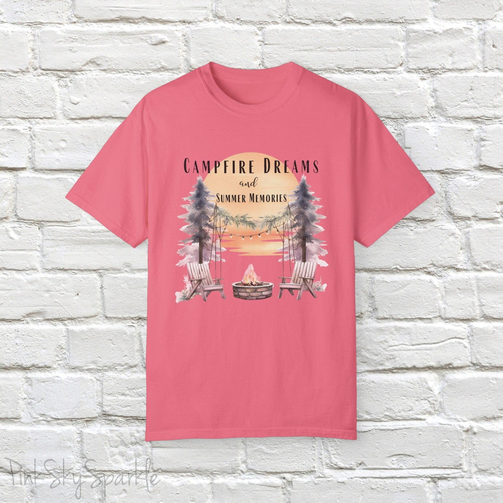 Campfire Dreams and Summer Memories Unisex Garment-Dyed T-shirt. Escape to the great outdoors with our Campfire Dreams and Summer Memories Garment-Dyed T-shirt. Made from soft, high-quality fabric, this shirt is perfect for cozy nights by the fire or creating unforgettable summer memories. Featuring the graphics of a scenery of a sunset, trees, patio lights, a fire pit and two wood chairs.