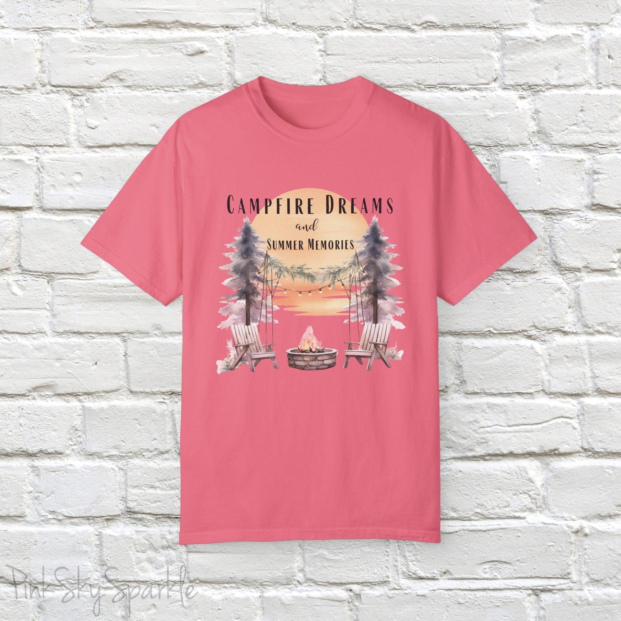 Campfire Dreams and Summer Memories Unisex Garment-Dyed T-shirt. Escape to the great outdoors with our Campfire Dreams and Summer Memories Garment-Dyed T-shirt. Made from soft, high-quality fabric, this shirt is perfect for cozy nights by the fire or creating unforgettable summer memories. Featuring the graphics of a scenery of a sunset, trees, patio lights, a fire pit and two wood chairs.