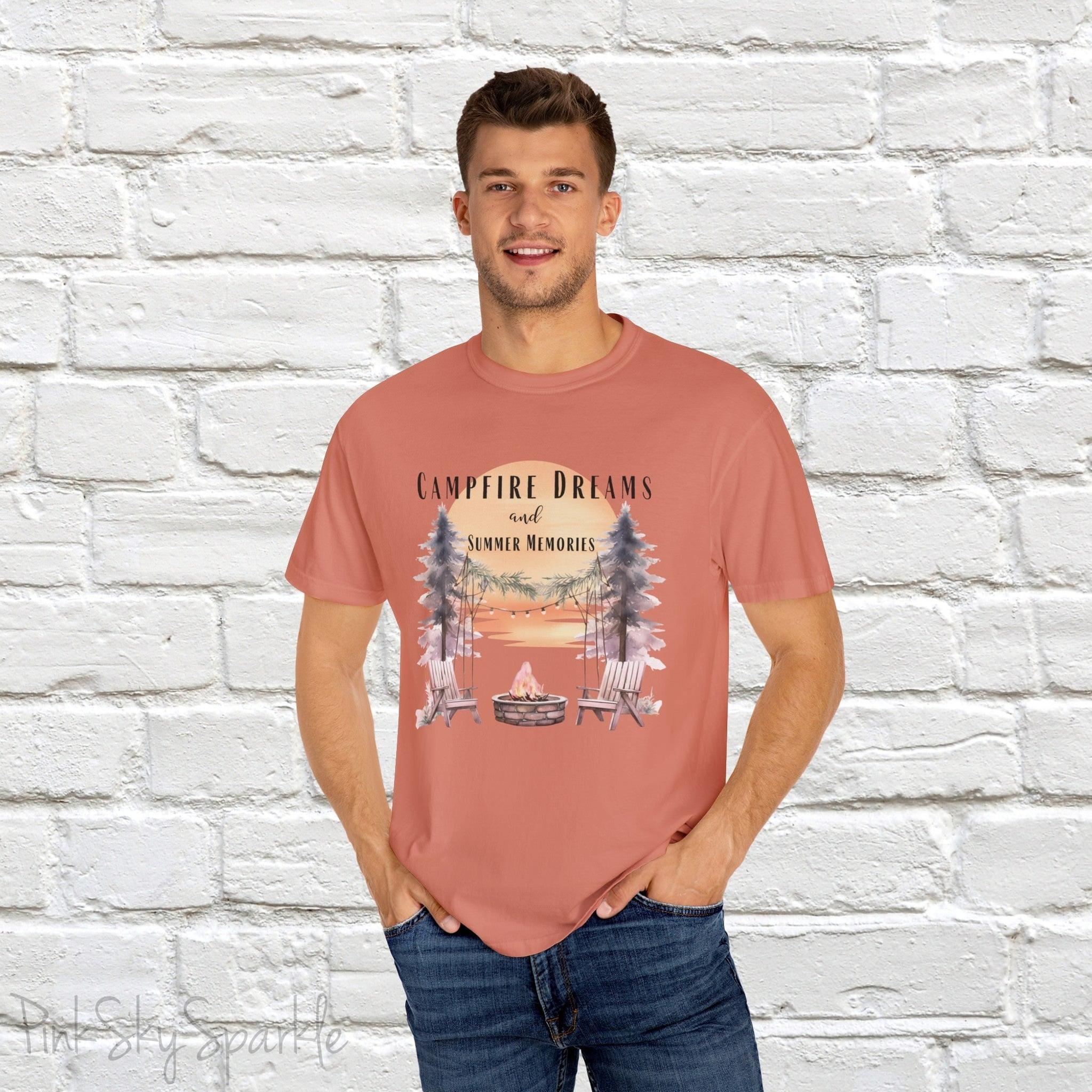 Campfire Dreams and Summer Memories Unisex Garment-Dyed T-shirt. Escape to the great outdoors with our Campfire Dreams and Summer Memories Garment-Dyed T-shirt. Made from soft, high-quality fabric, this shirt is perfect for cozy nights by the fire or creating unforgettable summer memories. Featuring the graphics of a scenery of a sunset, trees, patio lights, a fire pit and two wood chairs.