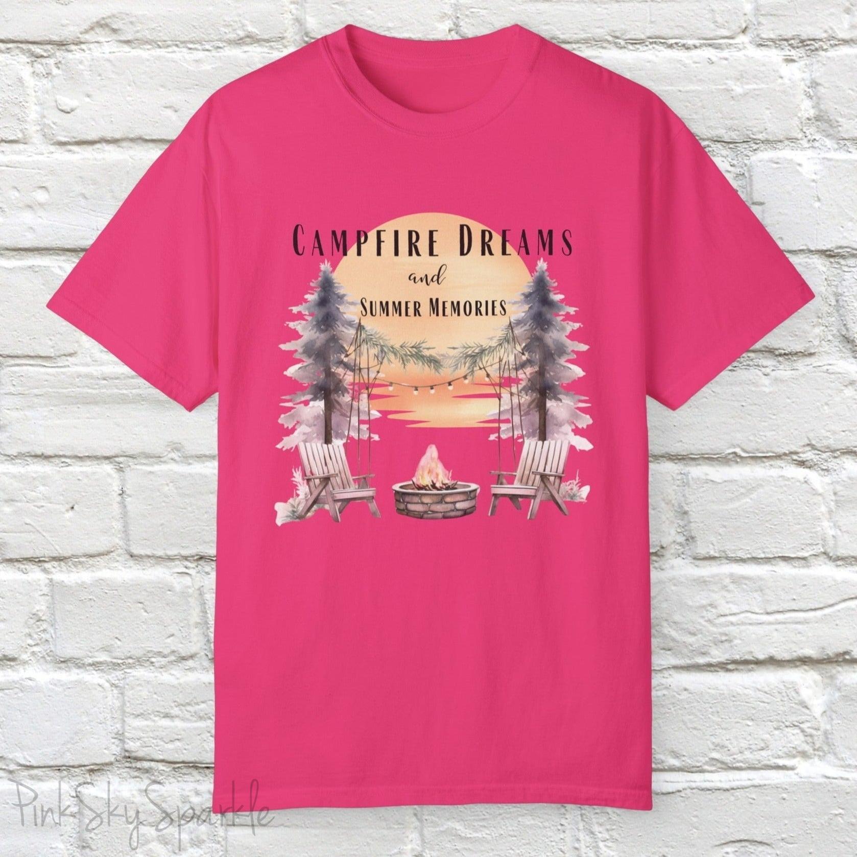 Campfire Dreams and Summer Memories Unisex Garment-Dyed T-shirt. Escape to the great outdoors with our Campfire Dreams and Summer Memories Garment-Dyed T-shirt. Made from soft, high-quality fabric, this shirt is perfect for cozy nights by the fire or creating unforgettable summer memories. Featuring the graphics of a scenery of a sunset, trees, patio lights, a fire pit and two wood chairs.