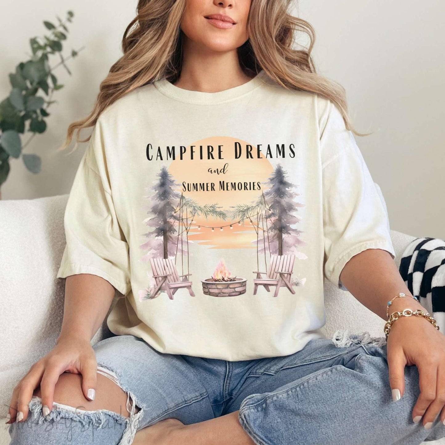 Campfire Dreams and Summer Memories Unisex Garment-Dyed T-shirt. Escape to the great outdoors with our Campfire Dreams and Summer Memories Garment-Dyed T-shirt. Made from soft, high-quality fabric, this shirt is perfect for cozy nights by the fire or creating unforgettable summer memories. Featuring the graphics of a scenery of a sunset, trees, patio lights, a fire pit and two wood chairs.