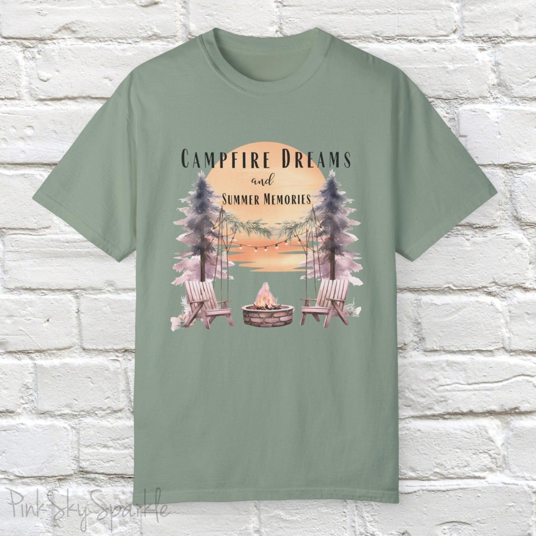 Campfire Dreams and Summer Memories Unisex Garment-Dyed T-shirt. Escape to the great outdoors with our Campfire Dreams and Summer Memories Garment-Dyed T-shirt. Made from soft, high-quality fabric, this shirt is perfect for cozy nights by the fire or creating unforgettable summer memories. Featuring the graphics of a scenery of a sunset, trees, patio lights, a fire pit and two wood chairs.