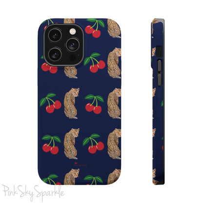 A stylish magnetic iPhone case featuring a unique pattern of leopards and bright red cherries on a dark navy blue background, blending bold and playful elements.