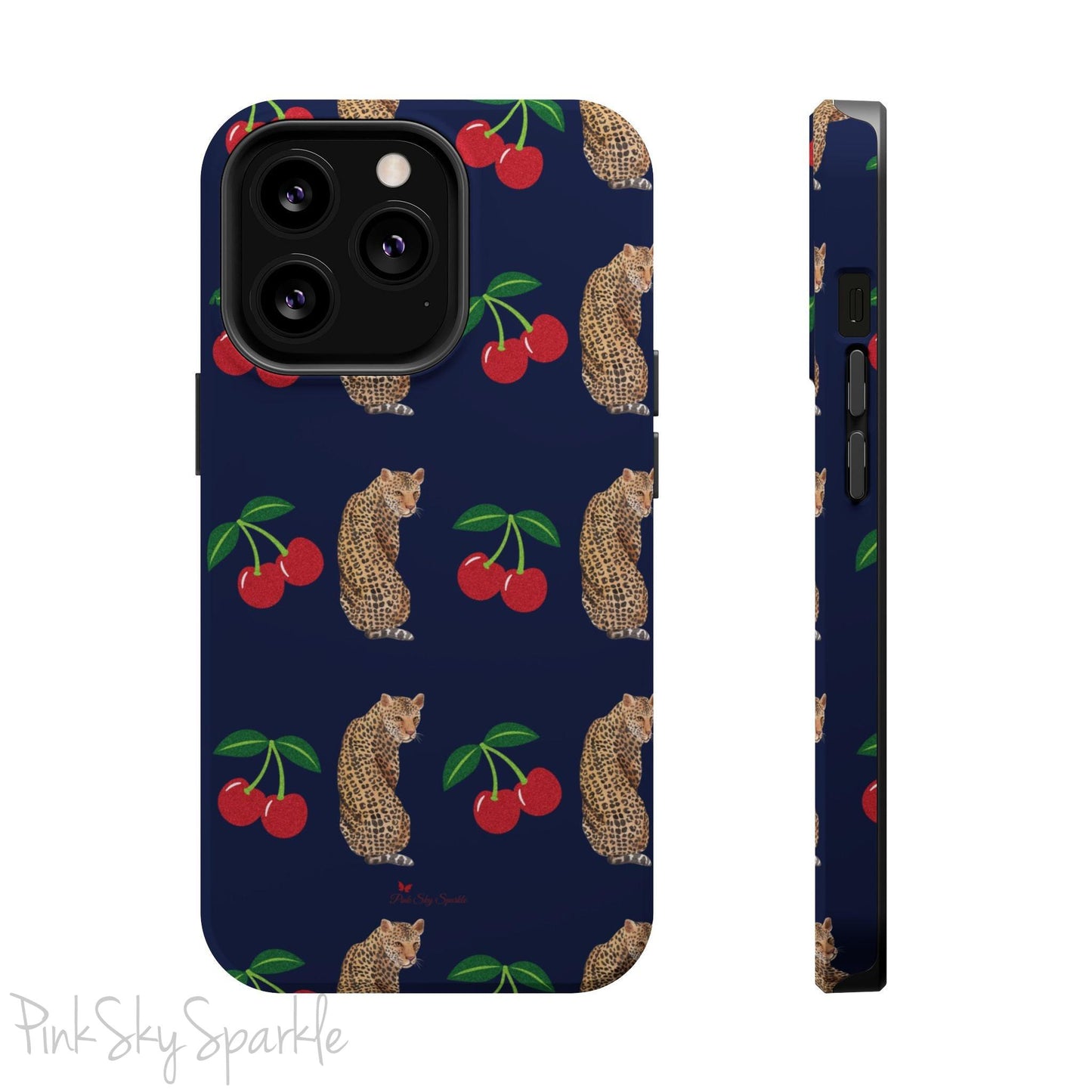 A stylish magnetic iPhone case featuring a unique pattern of leopards and bright red cherries on a dark navy blue background, blending bold and playful elements.