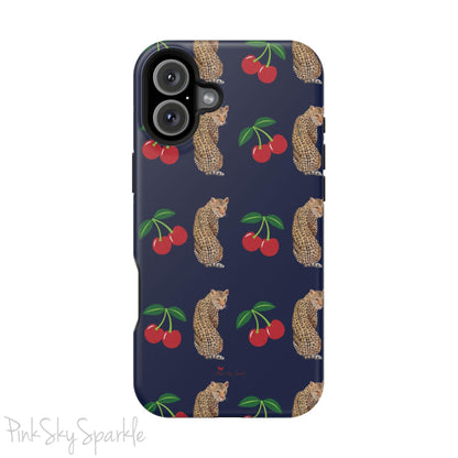 A stylish magnetic iPhone case featuring a unique pattern of leopards and bright red cherries on a dark navy blue background, blending bold and playful elements.