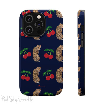 A stylish magnetic iPhone case featuring a unique pattern of leopards and bright red cherries on a dark navy blue background, blending bold and playful elements.