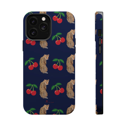 A stylish magnetic iPhone case featuring a unique pattern of leopards and bright red cherries on a dark navy blue background, blending bold and playful elements.