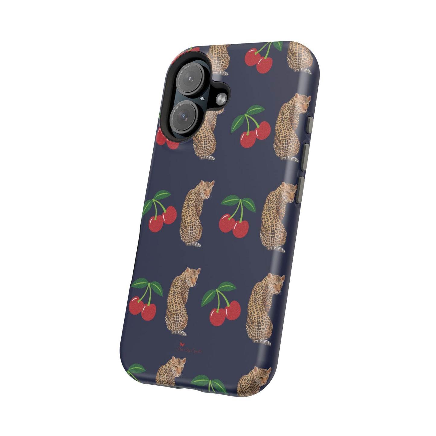 A stylish magnetic iPhone case featuring a unique pattern of leopards and bright red cherries on a dark navy blue background, blending bold and playful elements.