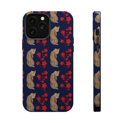 Crimson Jungle Magnetic iPhone Case featuring a leopard surrounded by vibrant red cherry blossoms on a navy blue background.