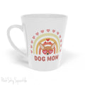 Dog Mom, Rainbow & Hearts Latte Mug. A white 12oz latte mug featuring a boho style rainbow with hearts and a chihuahua wearing heart shaped glasses in the center and the words Dog Mom written in all caps below it.