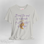 Embrace the excitement of a new era with our End of a Decade, Start of an Age T-shirt, inspired by Taylor Swift's iconic lyrics. Featuring the words It was the end of a decade, But the start of an age in a purple marker script font with a gold silhouette of a woman wearing a crown.