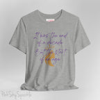 Embrace the excitement of a new era with our End of a Decade, Start of an Age T-shirt, inspired by Taylor Swift's iconic lyrics. Featuring the words It was the end of a decade, But the start of an age in a purple marker script font with a gold silhouette of a woman wearing a crown.