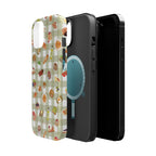 Two phone cases, one with a food-themed pattern and the other black, on a white background.