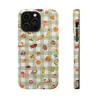 Phone case with food-themed pattern on a green checkered background