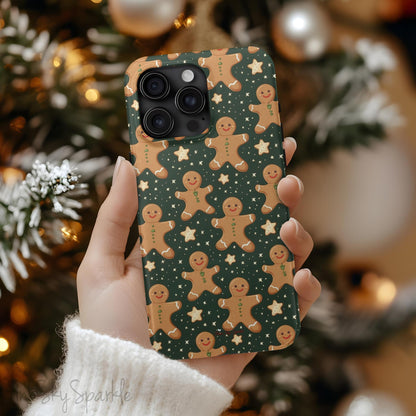 Gingerbread Dreams Magnetic iPhone Case featuring whimsical gingerbread cookies and a festive holiday design in warm, cozy colors. Compatible with iPhone models 13, 14, 15, and 16, this durable case is both stylish and protective, perfect for spreading holiday cheer.