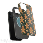 Gingerbread Dreams Magnetic iPhone Case featuring whimsical gingerbread cookies and a festive holiday design in warm, cozy colors. Compatible with iPhone models 13, 14, 15, and 16, this durable case is both stylish and protective, perfect for spreading holiday cheer.