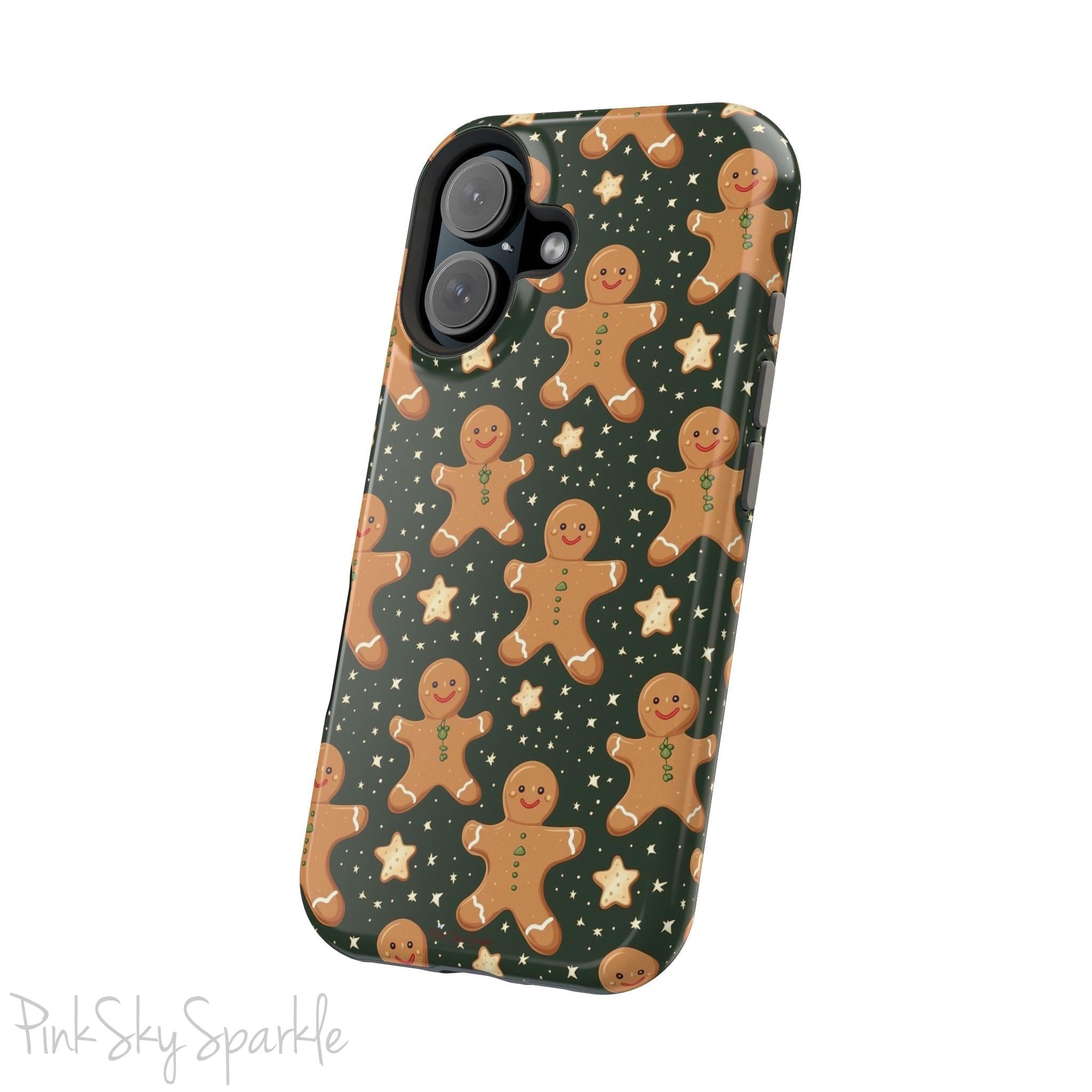 Gingerbread Dreams Magnetic iPhone Case featuring whimsical gingerbread cookies and a festive holiday design in warm, cozy colors. Compatible with iPhone models 13, 14, 15, and 16, this durable case is both stylish and protective, perfect for spreading holiday cheer.