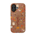 Phone case with autumn-themed design on a white background
