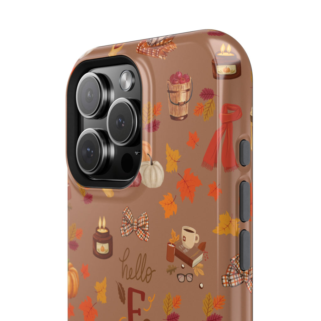 Phone case with autumn-themed design on a brown background