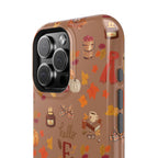Phone case with autumn-themed design on a brown background