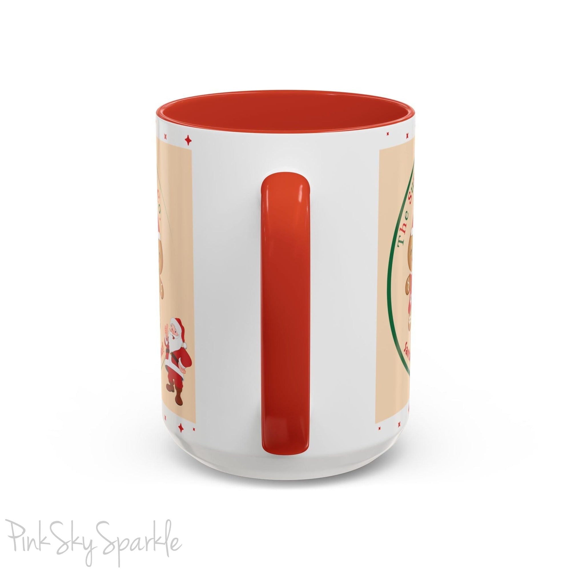 Holiday Gingerbread Coffee Mug featuring a male and female gingerbread cookies next to Santa with giving a thumbs up and the writing The Sugary Ginger Co. written at the top and Santa's favourite cookies at the bottom. The mug has a red handle and red interior. 