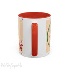 Holiday Gingerbread Coffee Mug featuring a male and female gingerbread cookies next to Santa with giving a thumbs up and the writing The Sugary Ginger Co. written at the top and Santa's favourite cookies at the bottom. The mug has a red handle and red interior. 
