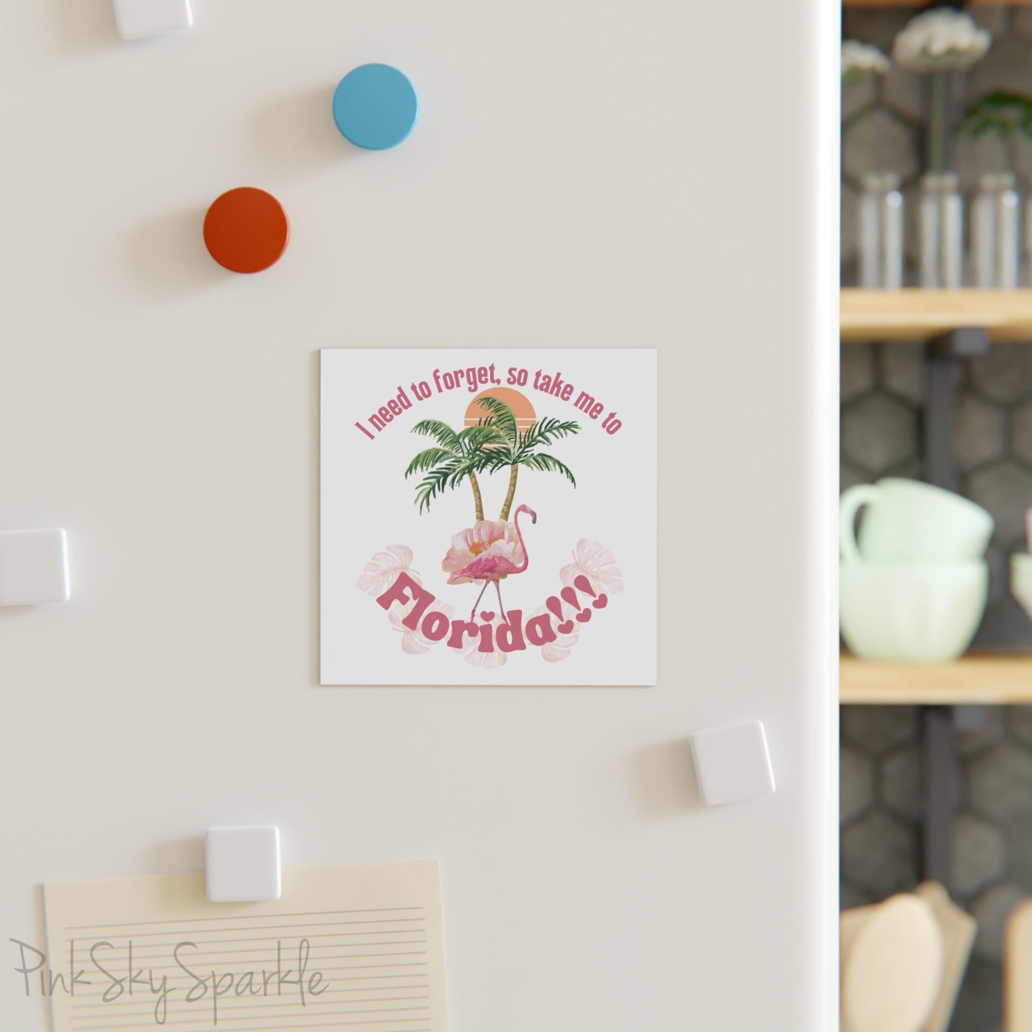 I Need to Forget, So Take Me to Florida!!! Square Magnet. Featuring a flamingo in front of two palm trees and a sun. The perfect gift for any Swiftie.