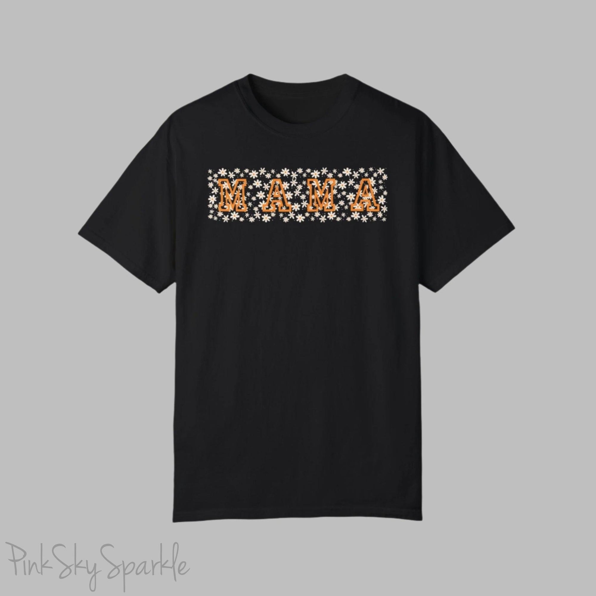 The bold 'MAMA' lettering, overlaid on a charming daisy pattern, makes this shirt a standout piece. Whether you're running errands, meeting friends for coffee, or just enjoying a quiet day at home, this t-shirt is your go-to for effortless style.&nbsp;