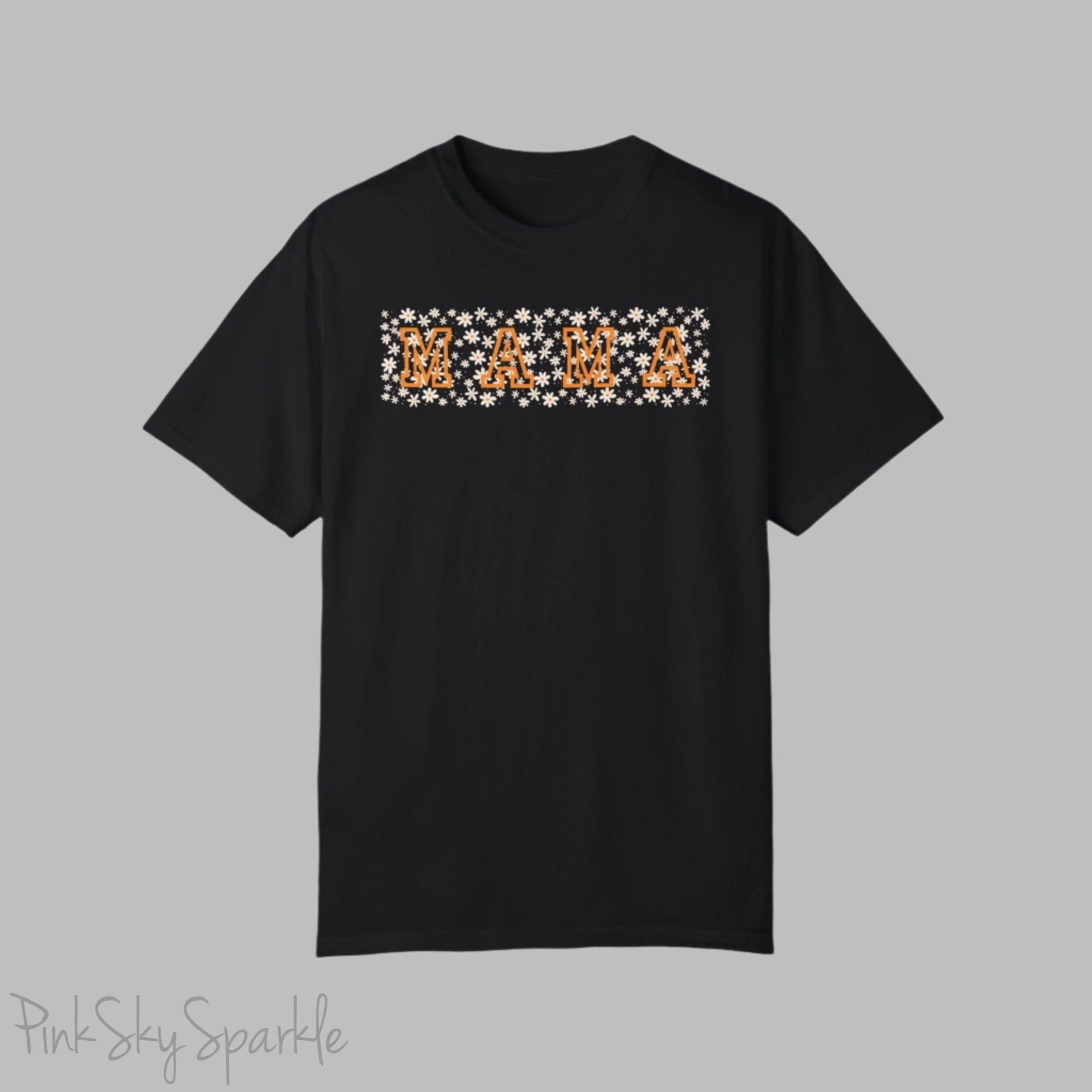 The bold 'MAMA' lettering, overlaid on a charming daisy pattern, makes this shirt a standout piece. Whether you're running errands, meeting friends for coffee, or just enjoying a quiet day at home, this t-shirt is your go-to for effortless style.&nbsp;