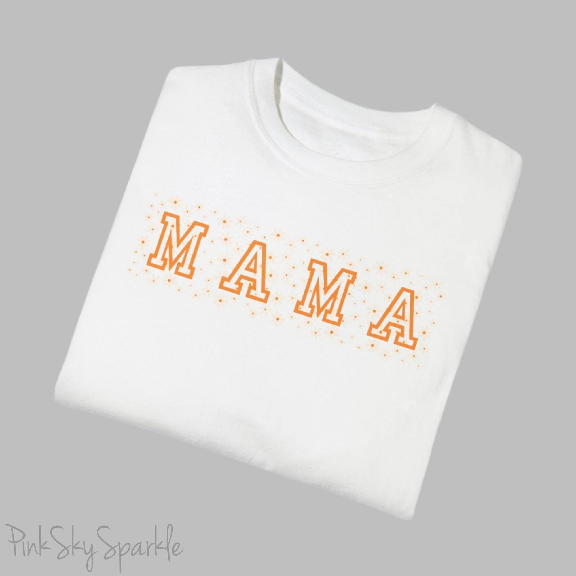The bold 'MAMA' lettering, overlaid on a charming daisy pattern, makes this shirt a standout piece. Whether you're running errands, meeting friends for coffee, or just enjoying a quiet day at home, this t-shirt is your go-to for effortless style.&nbsp;