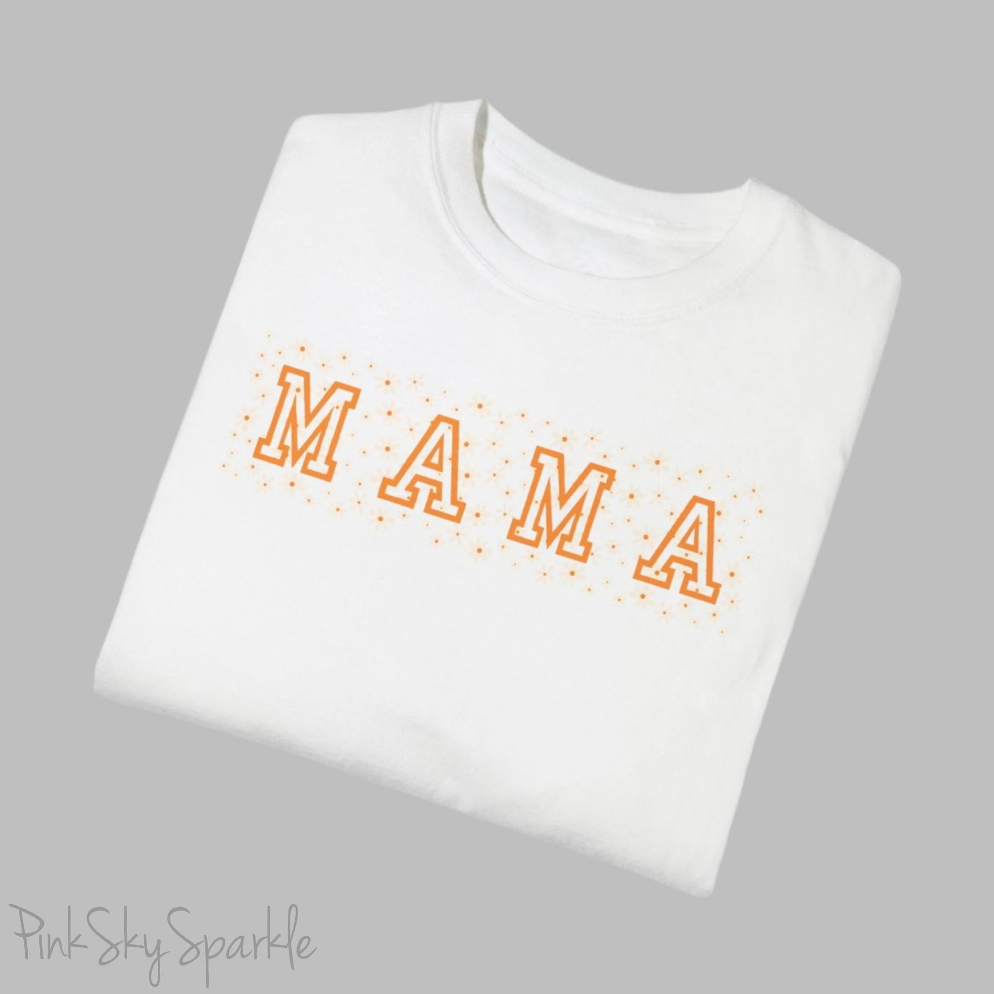 The bold 'MAMA' lettering, overlaid on a charming daisy pattern, makes this shirt a standout piece. Whether you're running errands, meeting friends for coffee, or just enjoying a quiet day at home, this t-shirt is your go-to for effortless style.&nbsp;