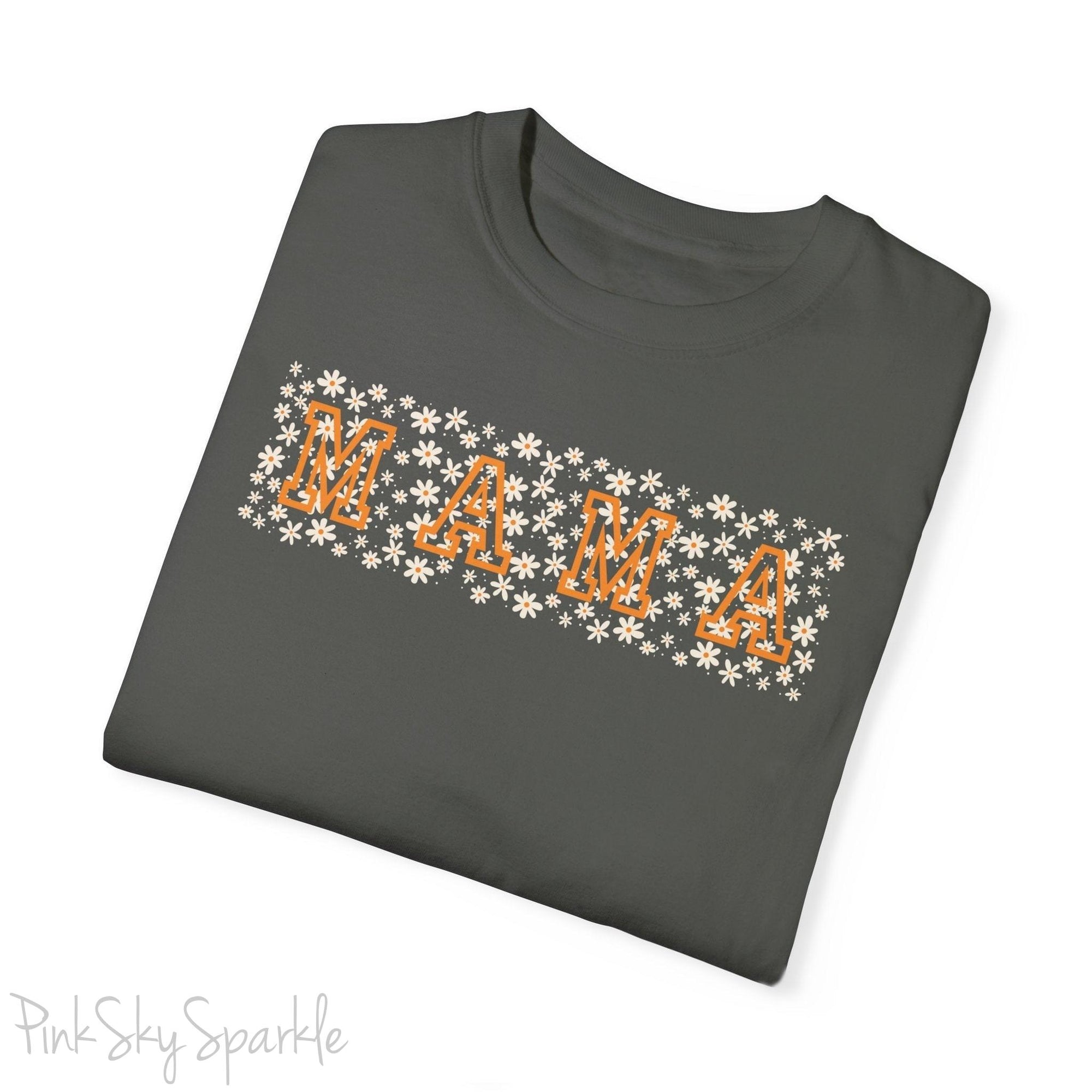 The bold 'MAMA' lettering, overlaid on a charming daisy pattern, makes this shirt a standout piece. Whether you're running errands, meeting friends for coffee, or just enjoying a quiet day at home, this t-shirt is your go-to for effortless style.&nbsp;