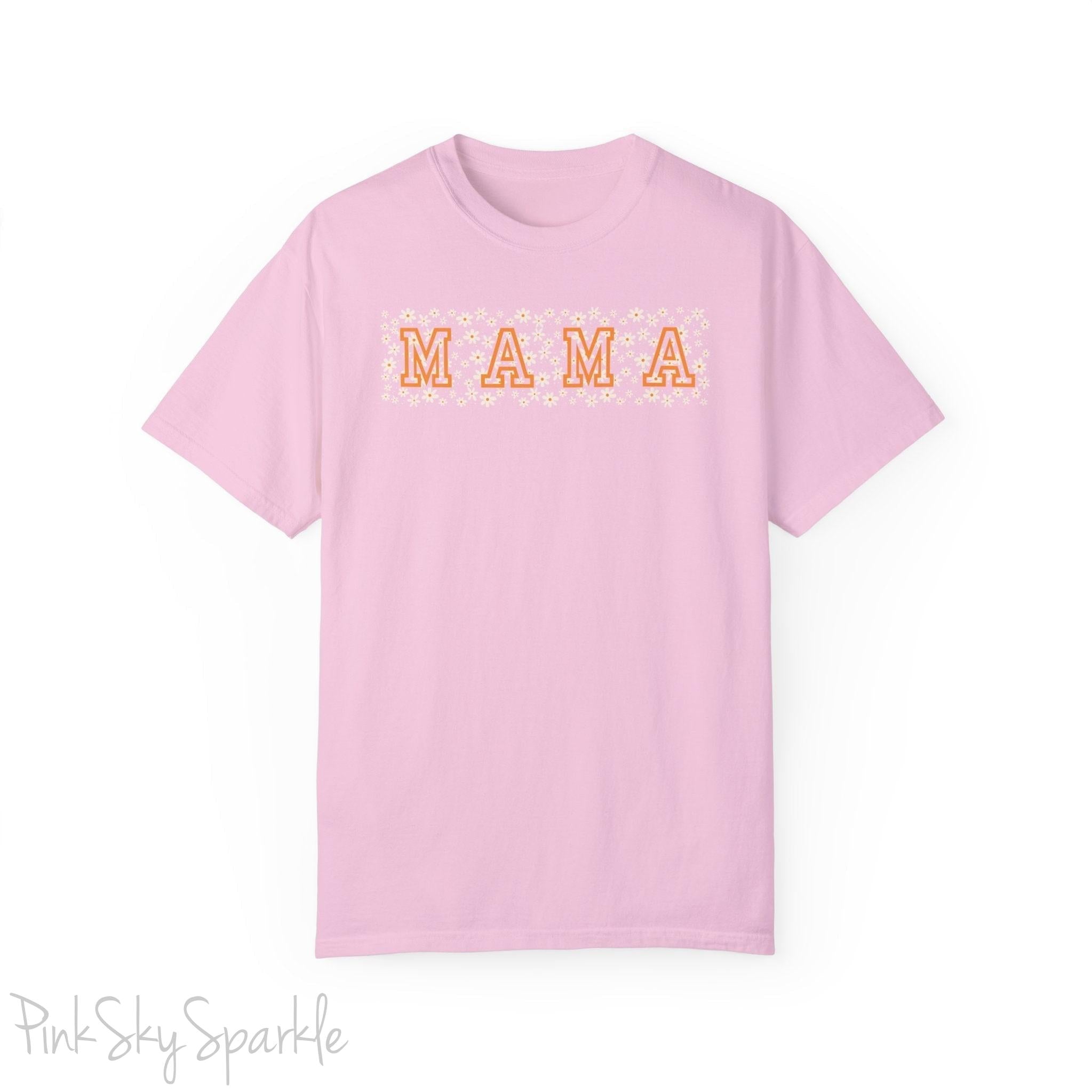 The bold 'MAMA' lettering, overlaid on a charming daisy pattern, makes this shirt a standout piece. Whether you're running errands, meeting friends for coffee, or just enjoying a quiet day at home, this t-shirt is your go-to for effortless style.&nbsp;