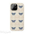 Add a touch of elegance to your phone with the Midnight Flutter Slim iPhone Case. Featuring a neutral background and navy blue butterflies.