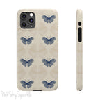 Add a touch of elegance to your phone with the Midnight Flutter Slim iPhone Case. Featuring a neutral background and navy blue butterflies.