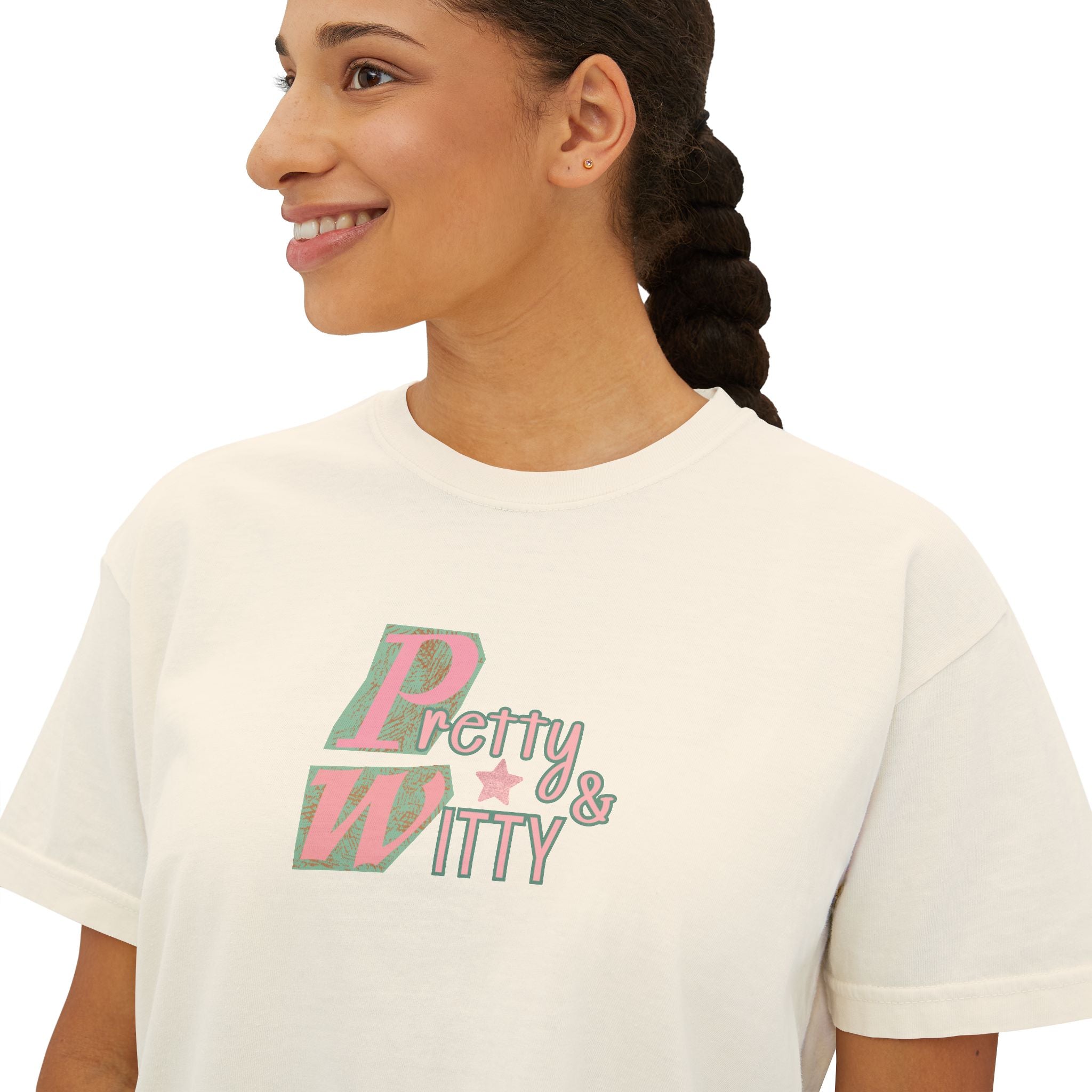 Woman wearing a white t-shirt with 'Pretty & Witty' text design.