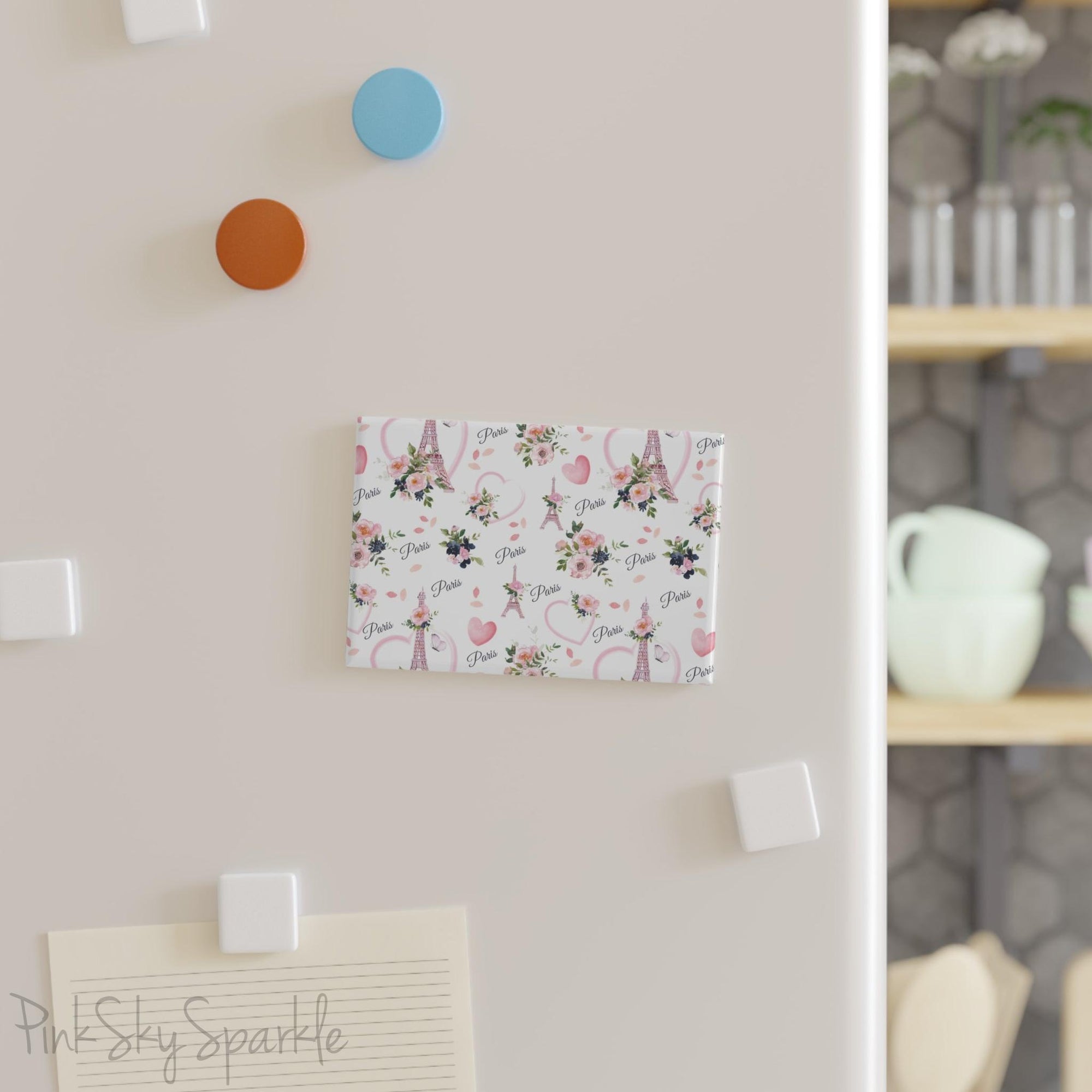 Parisian Bloom Rectangle Button Magnet - Charming magnet featuring the Eiffel Tower with soft pastel pinks, greens, and navy colors, adorned with beautiful flowers. A perfect Paris-inspired decor piece and thoughtful gift for flower and travel lovers.