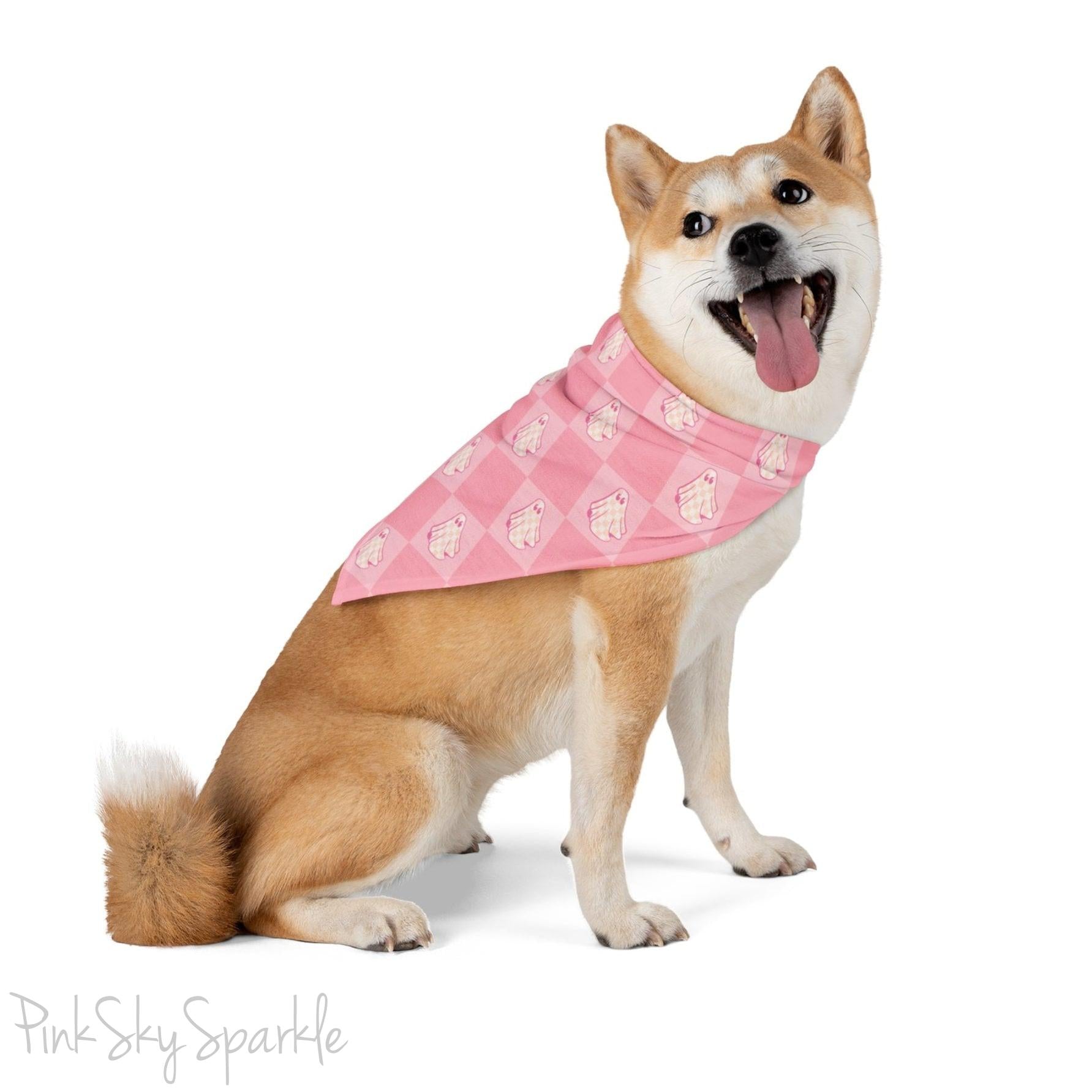 Pink bandana with a checkered ghost print for pets. Perfect for dressing p your pet for Halloween season, or anytime of year! 
