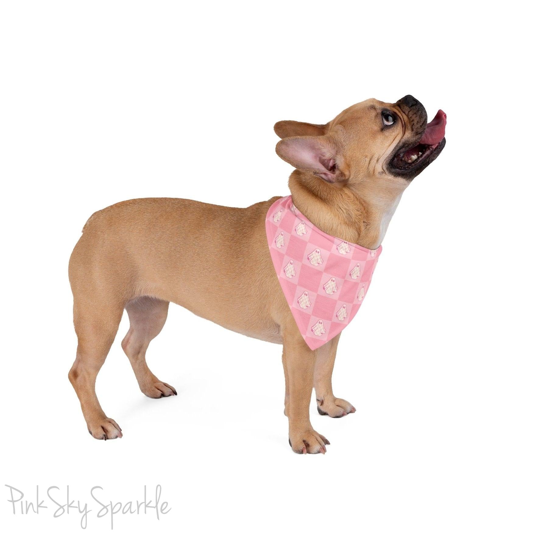 Pink bandana with a checkered ghost print for pets. Perfect for dressing p your pet for Halloween season, or anytime of year! 