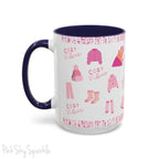 Pink Cozy Vibes Mug - Perfect for coffee, tea, or hot cocoa lovers! This ceramic mug features 'cozy vibes' in a pink font, surrounded by cute illustrations of pink cozy items such as slippers, mittens, blankets and candles. Ideal for creating a warm, cozy atmosphere, this pink-handled mug (also available in light blue, black and navy) makes a great gift for anyone who loves comfort, style and the color pink.