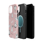 Pink phone case with ghost illustrations, showing the centre of the case featuring a magnet for compatibility with MagSafe accessories.