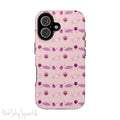Pink Tough Magnetic iPhone Case with a pink and purple Halloween candy pattern. 