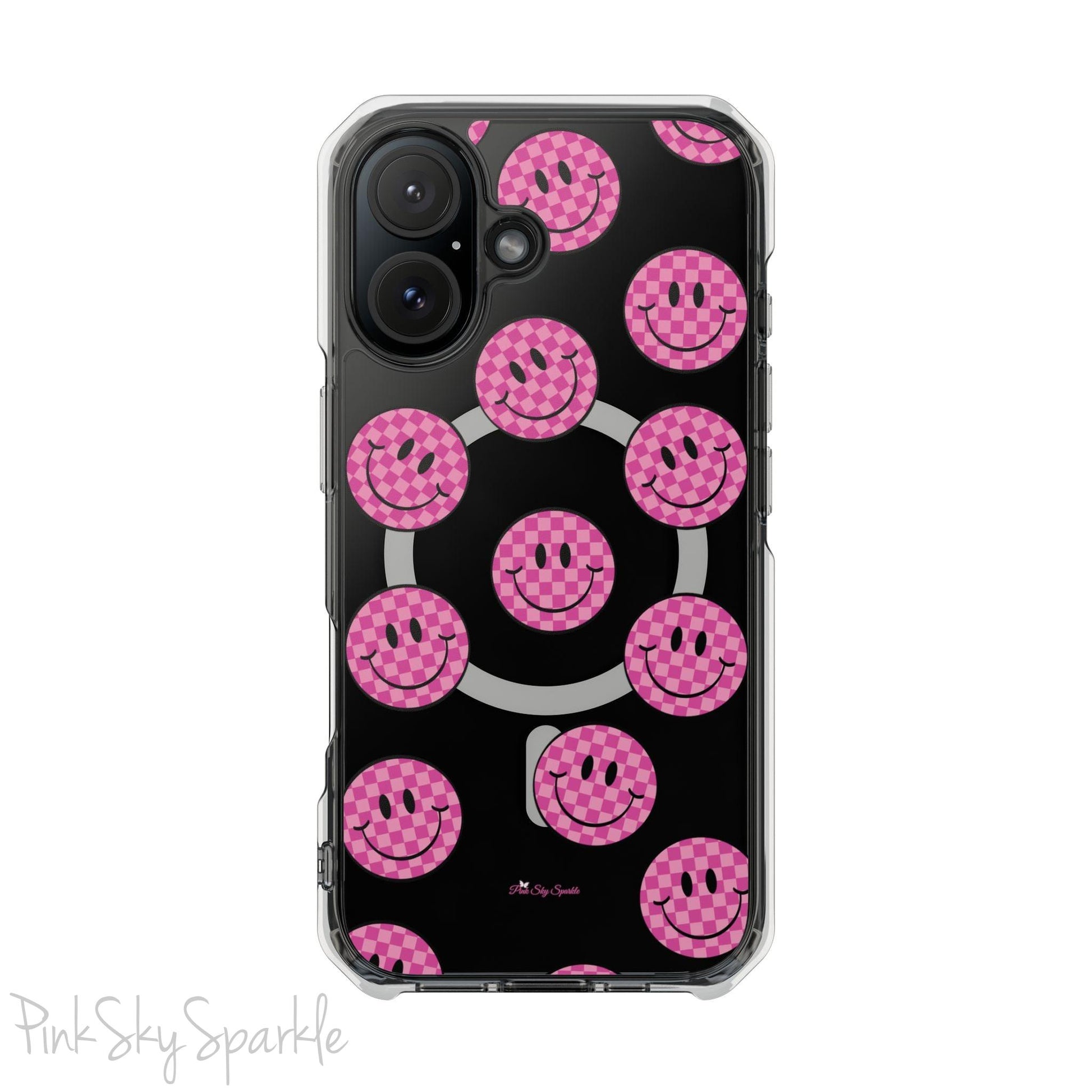 Clear magnetic phone case featuring pink checkered smiley faces on a transparent background, designed for MagSafe® compatibility with air-cushioned bumper corners.