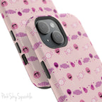 Pink Tough Magnetic iPhone Case with a pink and purple Halloween candy pattern. 