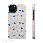 Make a statement with the Safety Pin Magnetic iPhone Case. Featuring a sleek design of blue safety pins, this case adds unique flair while providing durable protection for iPhone models 13, 14, 15, and 16.
